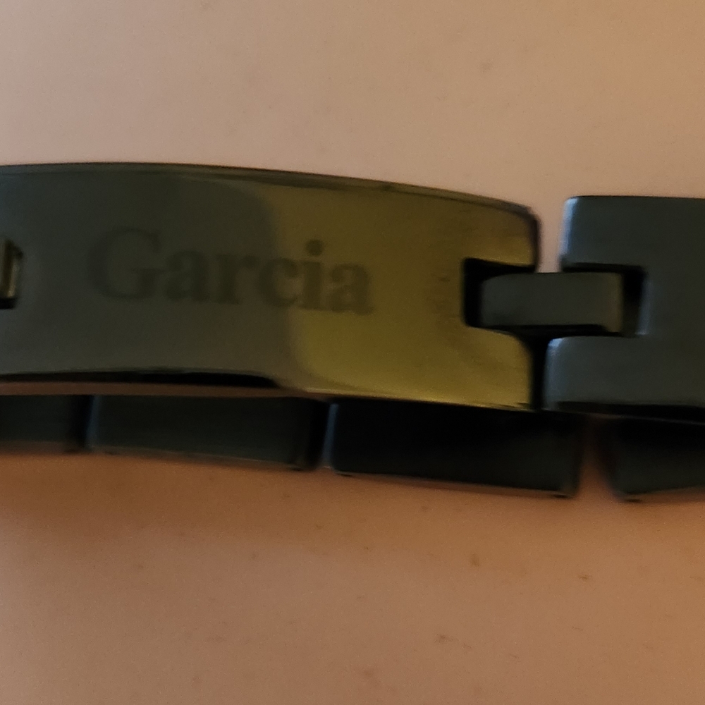 Bracelet for men size 8 inches with couple of links to add if needed. GARCIA